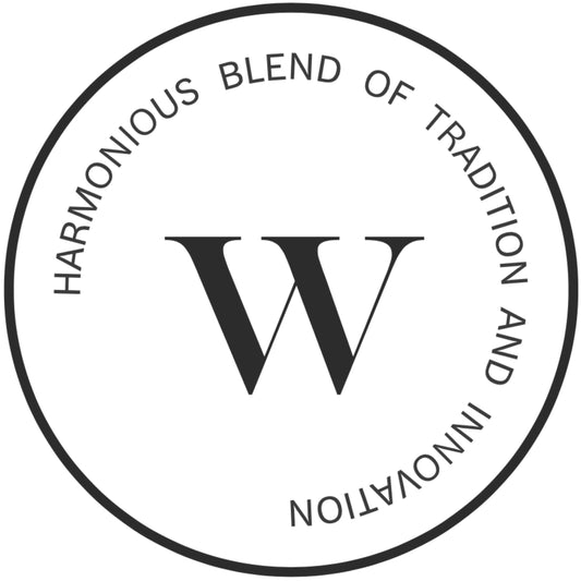 Wholeness brand emblem with W inside a circle, illustrating harmony between heritage and contemporary design